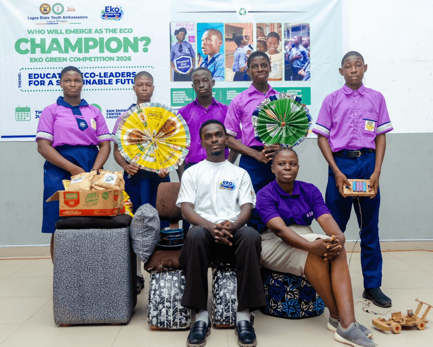 Students showcasing projects built from recycled materials at the Eko Green Competition.